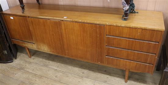A 1950s teak sideboard W.212cm